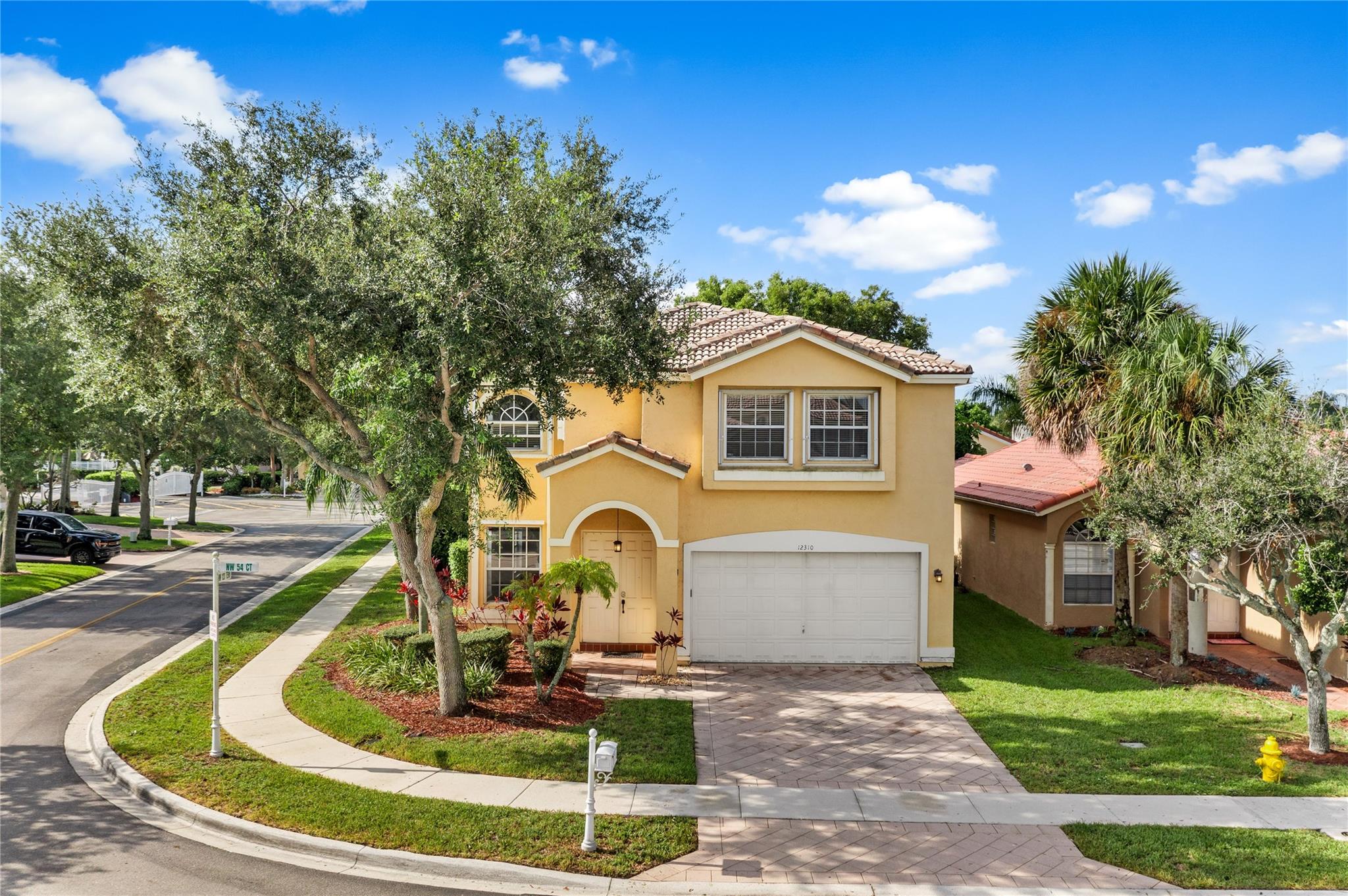 CORNER LOT!!! Welcome To Your Dream Coral Springs Home Located In The Mayfair Subdivision At The Exclusive Wyndham Lakes Community! It Offers 4 Beds & 2.5 Baths, A 2 Car Garage, A 2021 AC, Plenty Of Natural Light Thanks To The Corner Location, A Kid's Backyard Dream W/ A Fun & Safe Playground, Screened-in Porch, Master Bathroom W/ A Relaxing Full Of Light Tub, Separate Syncs Set On Beautiful Vanities, Elegant Glass Shower Door, Security Cameras. This Is A Quiet Gated Community, Family-friendly, Has A Beautiful Community Pool, Low HOA Fees & Convenient Access To Top-Rated Schools, Parks, Shopping, Major Roadways, Main Branded Stores, Movie Theater & Top Notch Dinning. OK TO LEASE RIGHT AWAY! DO NOT MISS YOUR CHANCE TO MAKE THIS HOME YOUR NEXT HOME!!