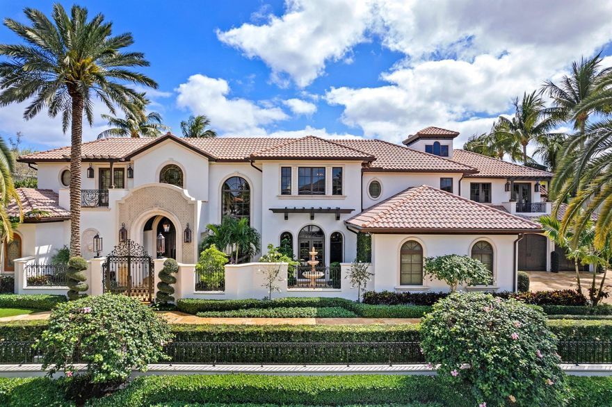Welcome to La Casa Delle Palme! This gated estate offers 150' of waterfront property overlooking the Royal Palm Waterway and the lush tropical landscape of Capone Island!