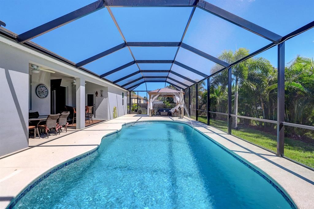 Photo of 1002 SE Walters Terrace, Port Saint Lucie, FL 34983 (MLS # R10837333)