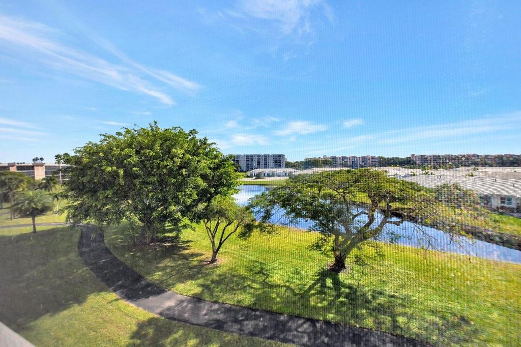 Photo of 7076 Huntington Lane #407, Delray Beach, FL 33446 (MLS # R11058193)