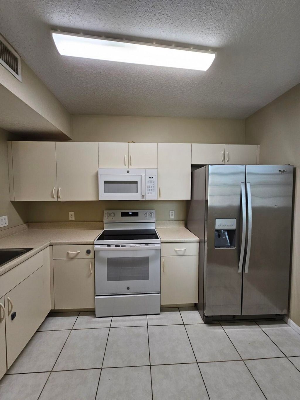 Photo of 1063 Golden Lakes Boulevard #311, West Palm Beach, FL 33411 (MLS # B26005112)