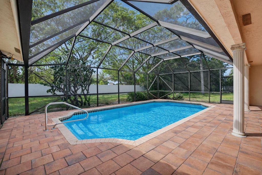 Photo of 2409 NW 32nd Street, Boca Raton, FL 33431 (MLS # R11156753)