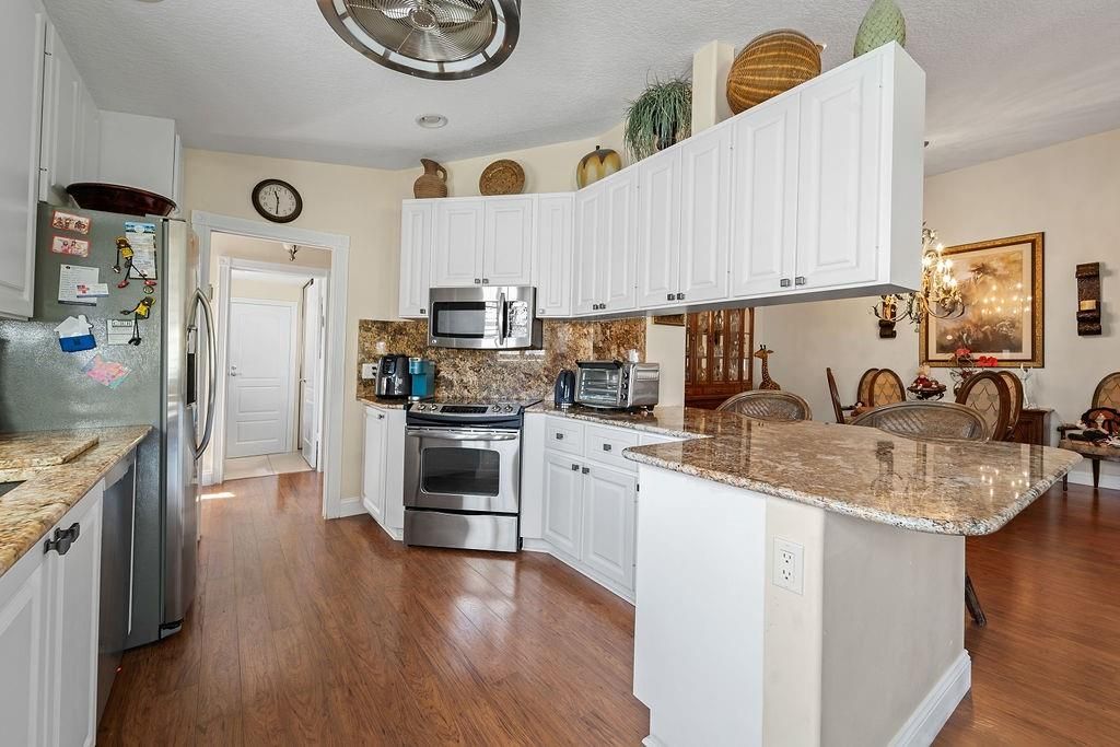 Photo of 8383 Cozumel Lane, Wellington, FL 33414 (MLS # F10463815)