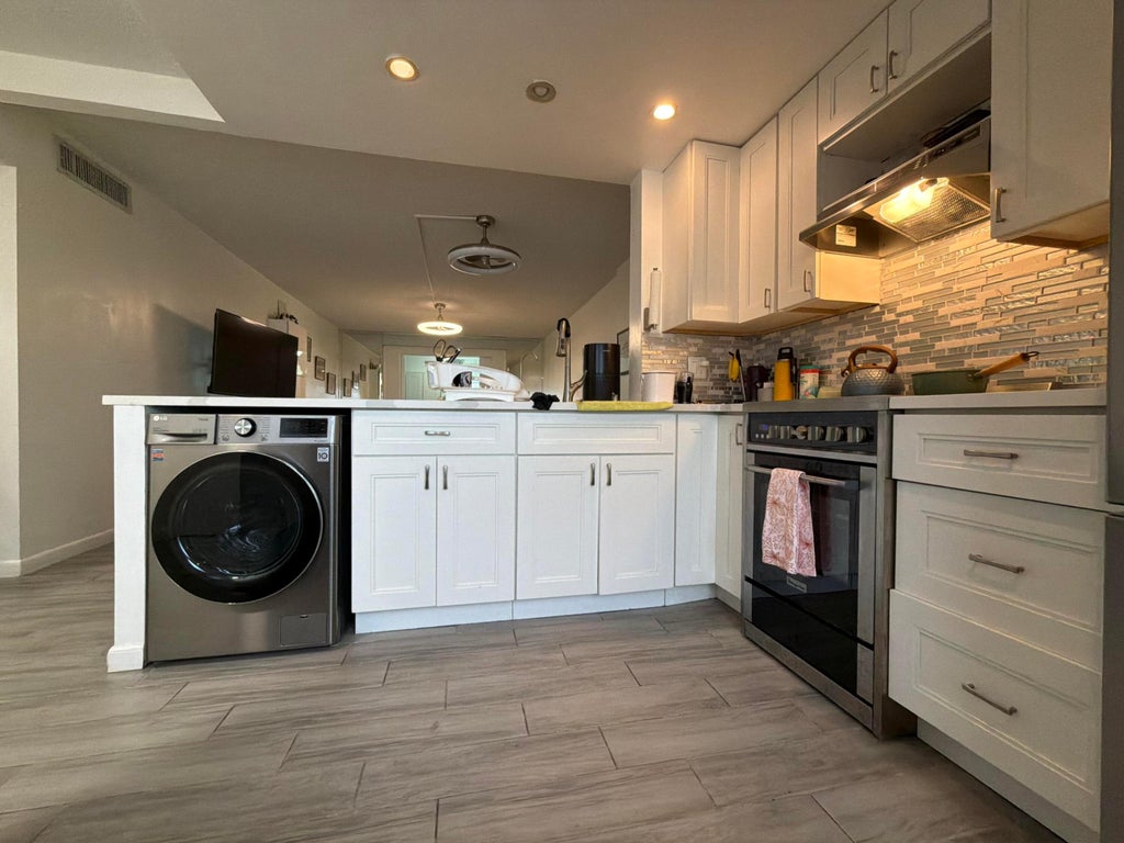 Photo of 320 NE 12th Avenue #105, Hallandale Beach, FL 33009 (MLS # B26084513)