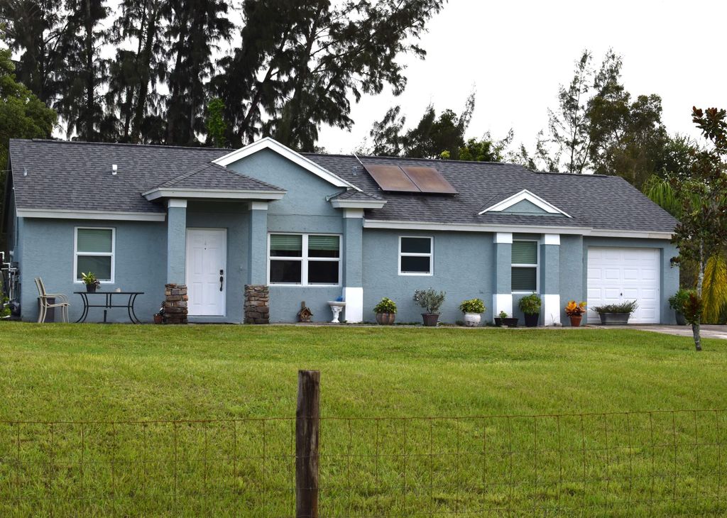Photo of 17338 35th Place N, The Acreage, FL 33470 (MLS # R11015432)