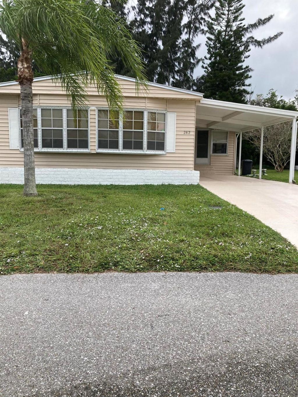 Photo of 262 W West Caribbean Blvd, Port Saint Lucie, FL 34952 (MLS # R10936939)