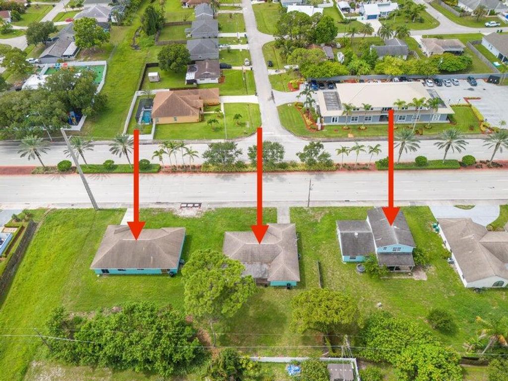 Photo of 565 SE Port St Lucie Boulevard, Port Saint Lucie, FL 34983 (MLS # R11163966)