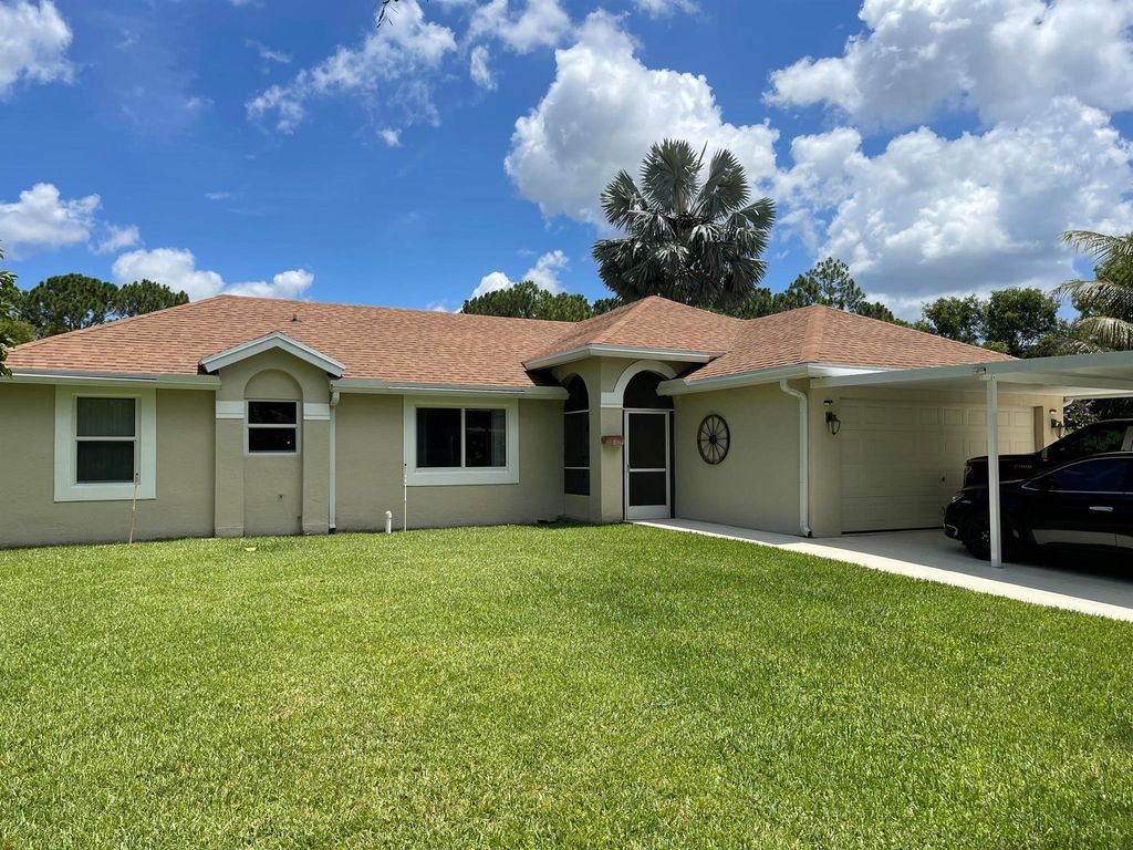 Photo of 14231 83rd Lane N, Loxahatchee, FL 33470 (MLS # R10939049)