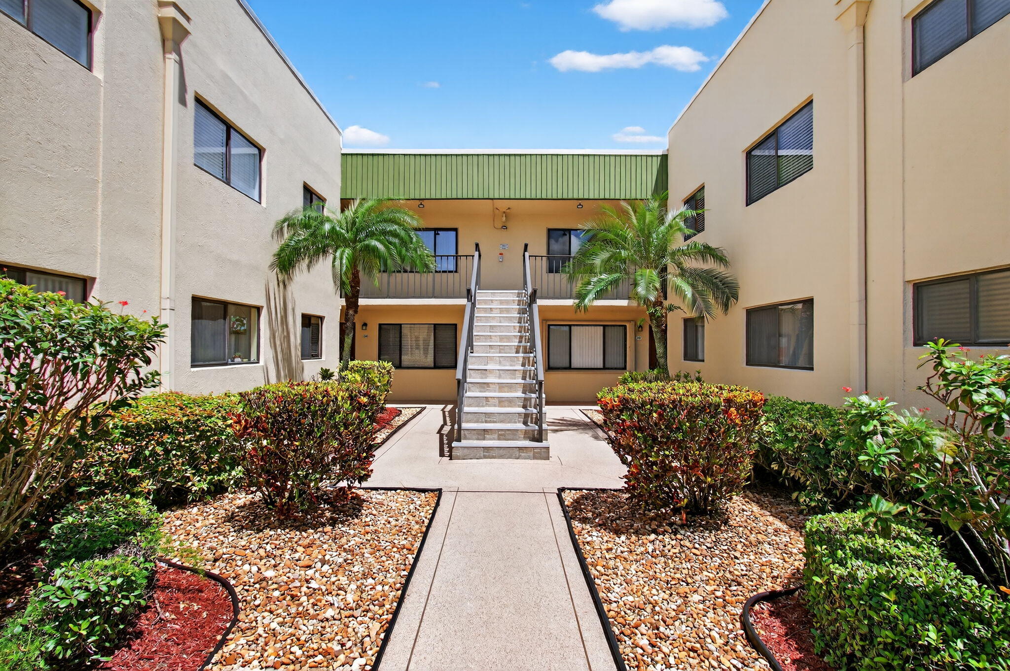 Introducing unit #92 at 15217 Lakes of Delray Boulevard located in the delightful city of Delray Beach, FL. This property serves as an epitome of modern residence, noteworthy in its practical and well-thought design.As you step into this first-floor unit, you are immediately welcomed into a spacious living area. Refined architectural detailing complements the interior design, providing an air of elegance that is complemented by the enclosed Florida room. This space can function as a serene personal oasis or a comfortable spot to entertain in style.