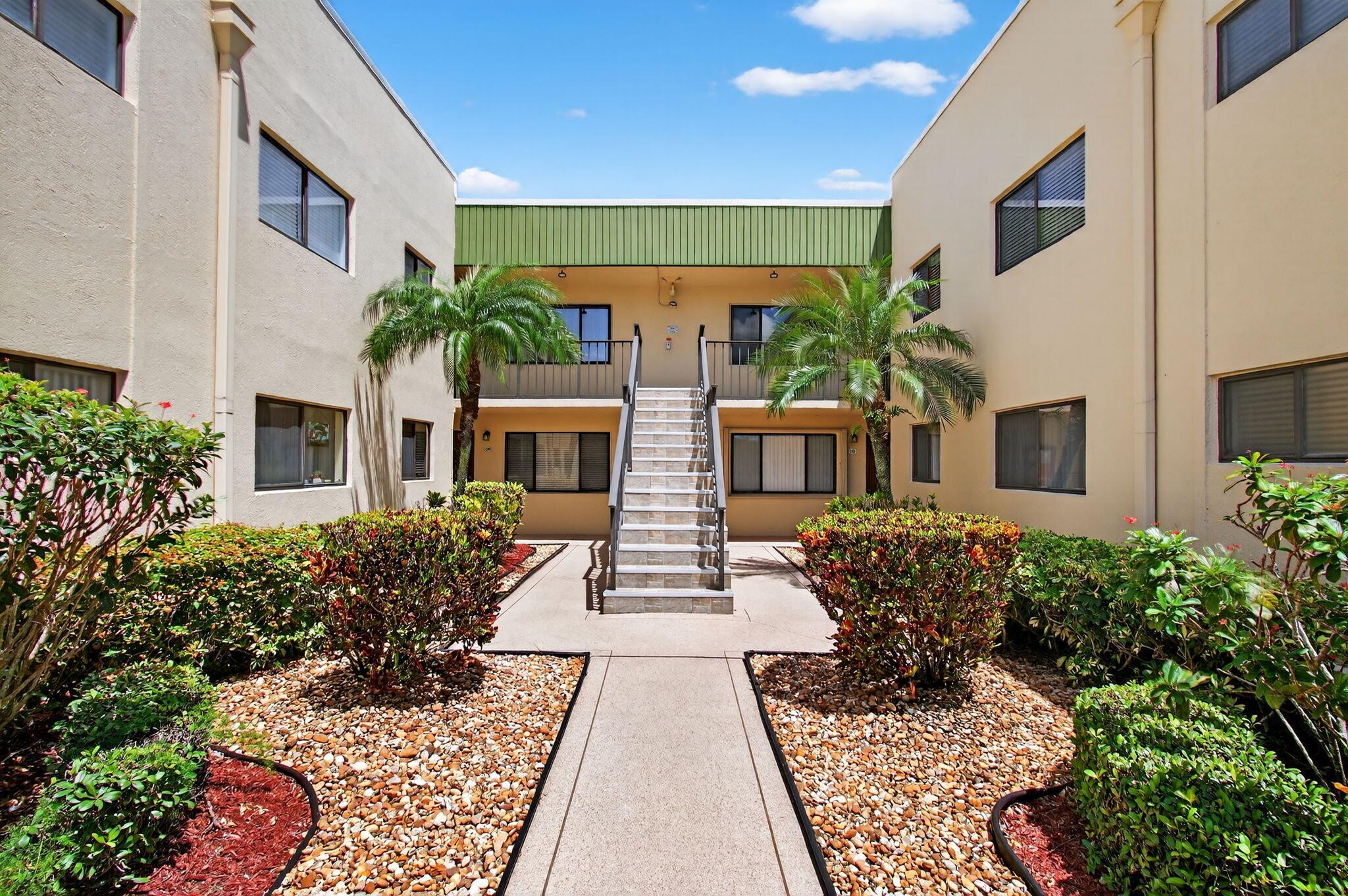 Introducing unit #92 at 15217 Lakes of Delray Boulevard located in the delightful city of Delray Beach, FL. This property serves as an epitome of modern residence, noteworthy in its practical and well-thought design.As you step into this first-floor unit, you are immediately welcomed into a spacious living area. Refined architectural detailing complements the interior design, providing an air of elegance that is complemented by the enclosed Florida room. This space can function as a serene personal oasis or a comfortable spot to entertain in style.