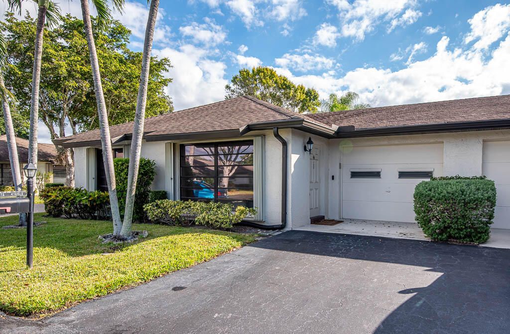 Photo of 4760 Greentree Way #A, Boynton Beach, FL 33436 (MLS # R11141962)