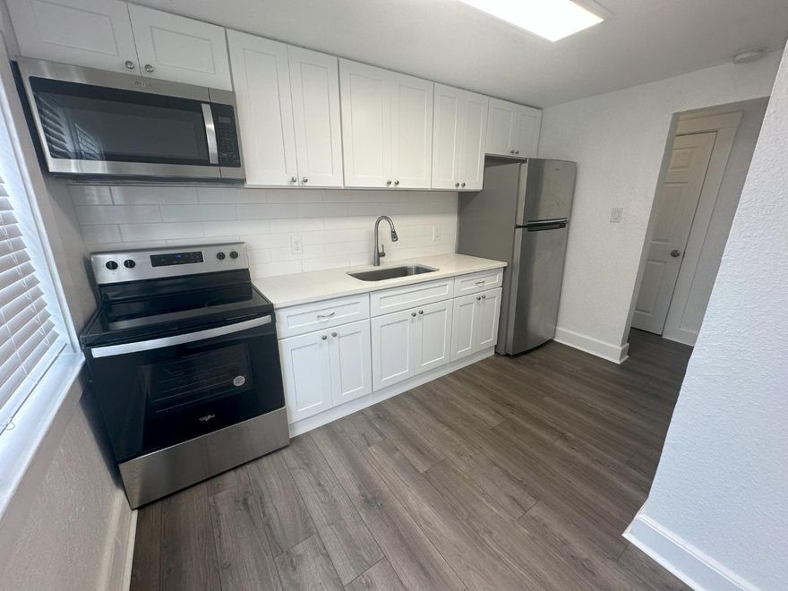 Updated Apartment with a refrigerator, range, and microwave. There are 2 entrance doors. One to the front of the building and one in the back leading to the parking lot. Located Near Boynton Beach Blvd East of I95. Must pass background check.   Rent: $1,800 Security Deposit: $3,600 (Security Deposit can be paid over time) Application $50 Electric: Paid by Tenant Internet: Paid by Tenant Water: Paid by Landlord Trash: Paid by Landlord