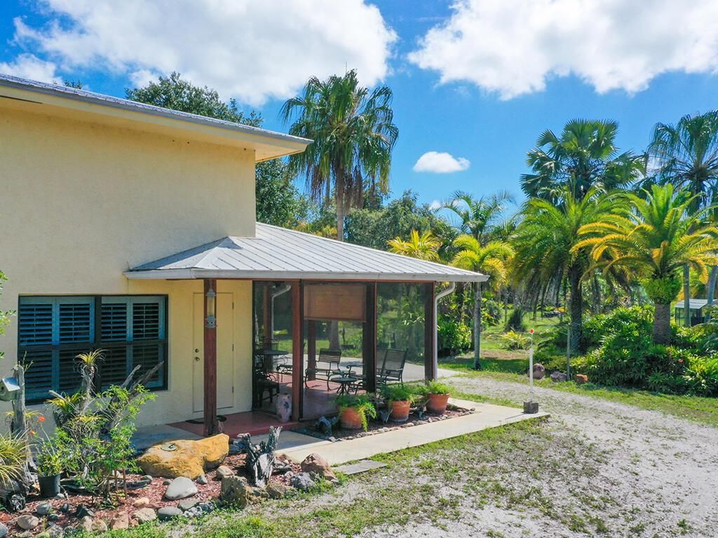 Photo of 5601 SW Sunshine Farms Way, Palm City, FL 34990 (MLS # R10803775)