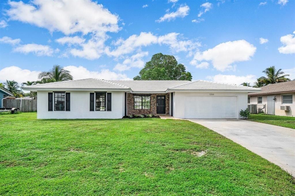 Photo of 1350 SW 26th Avenue, Boynton Beach, FL 33426 (MLS # R10749143)