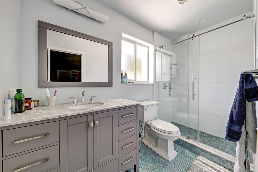 LOVELY 3/3 WITH EXTRA SPACE CAN BE OFFICE, DEN 4 TH BEDROOM.   ALL UPDATED BATHROOMS. KITCHEN VERY NICELY UPDATED, KITCEN-AID STAINLESS STEEL APPLIANCES. RECENT A/C AND WATER HEATER. ALL PIPES PBC. LARGE CORNER LOT ON A CUL-DE-SAC. 2 CAR GARAGE, EXTRA PARKING.