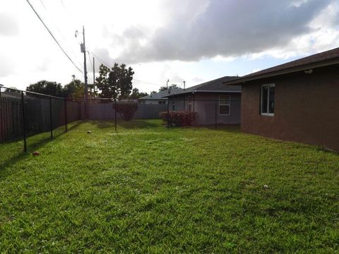 Tiny photo for 2764 NW 1st Court, Pompano Beach, FL 33069 (MLS # B26036672)