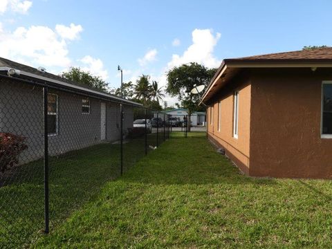 Tiny photo for 2764 NW 1st Court, Pompano Beach, FL 33069 (MLS # B26036672)