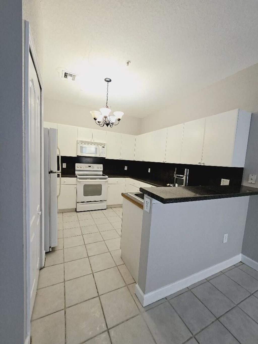 Photo of 1114 Shoma Drive, West Palm Beach, FL 33414 (MLS # R11020349)