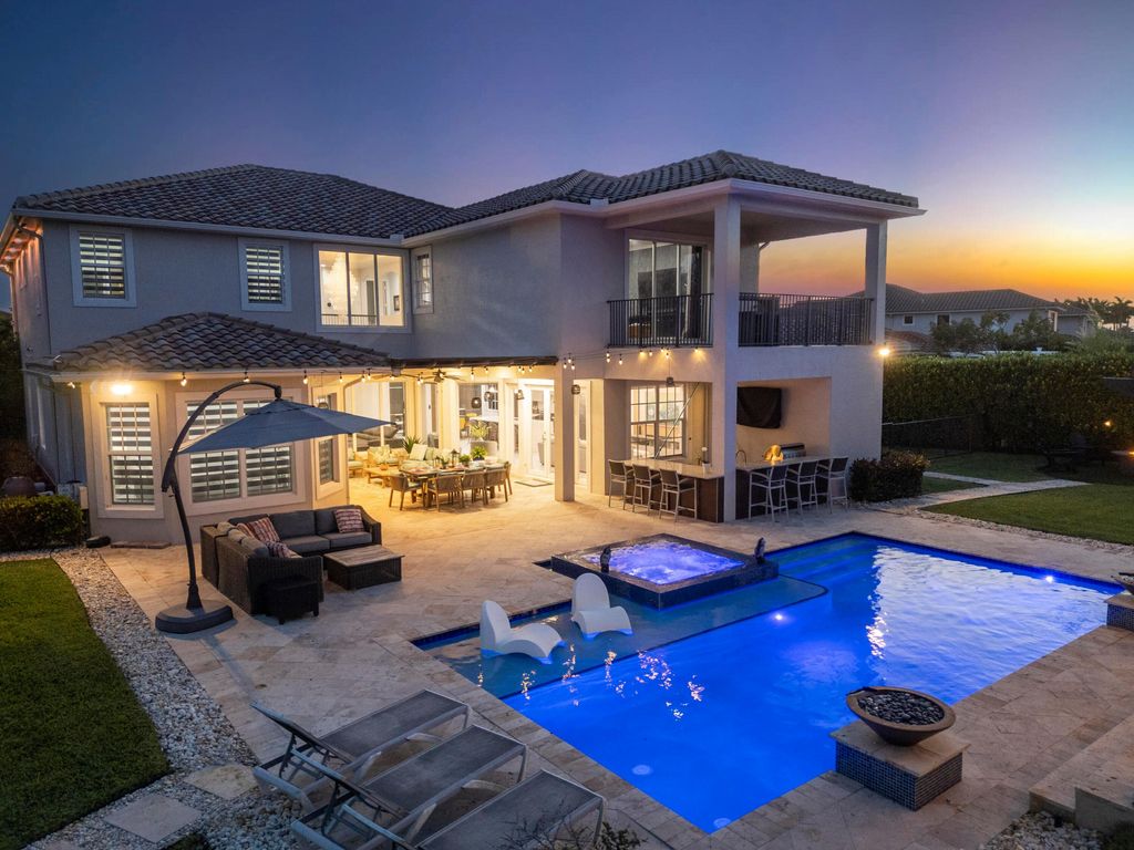 Photo of 8768 S Miralago Way, Parkland, FL 33076 (MLS # B26015474)