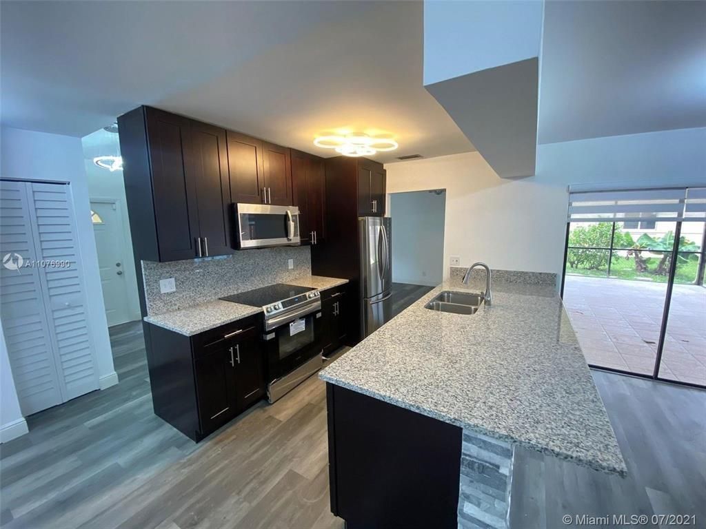 Photo of 9658 NW 28th Court, Coral Springs, FL 33065 (MLS # F10520091)