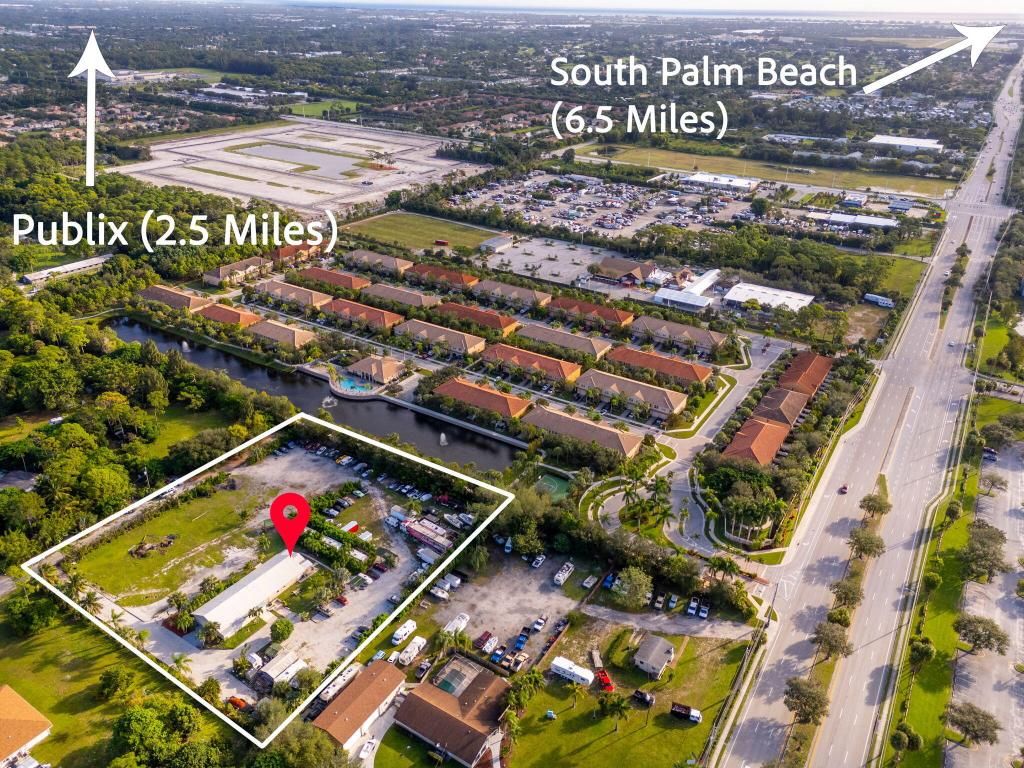 Photo of 5400 Thunderbird Drive, Lake Worth, FL 33463 (MLS # R11137295)