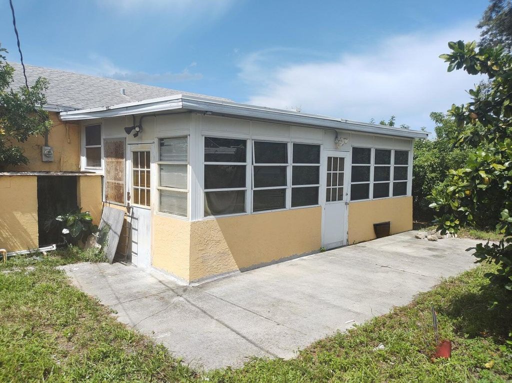 Photo of 587 W 4th Street, Riviera Beach, FL 33404 (MLS # R11148250)