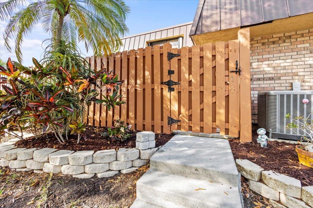 Photo of 6121 SE Windsong Lane #1016, Stuart, FL 34997 (MLS # R10955626)