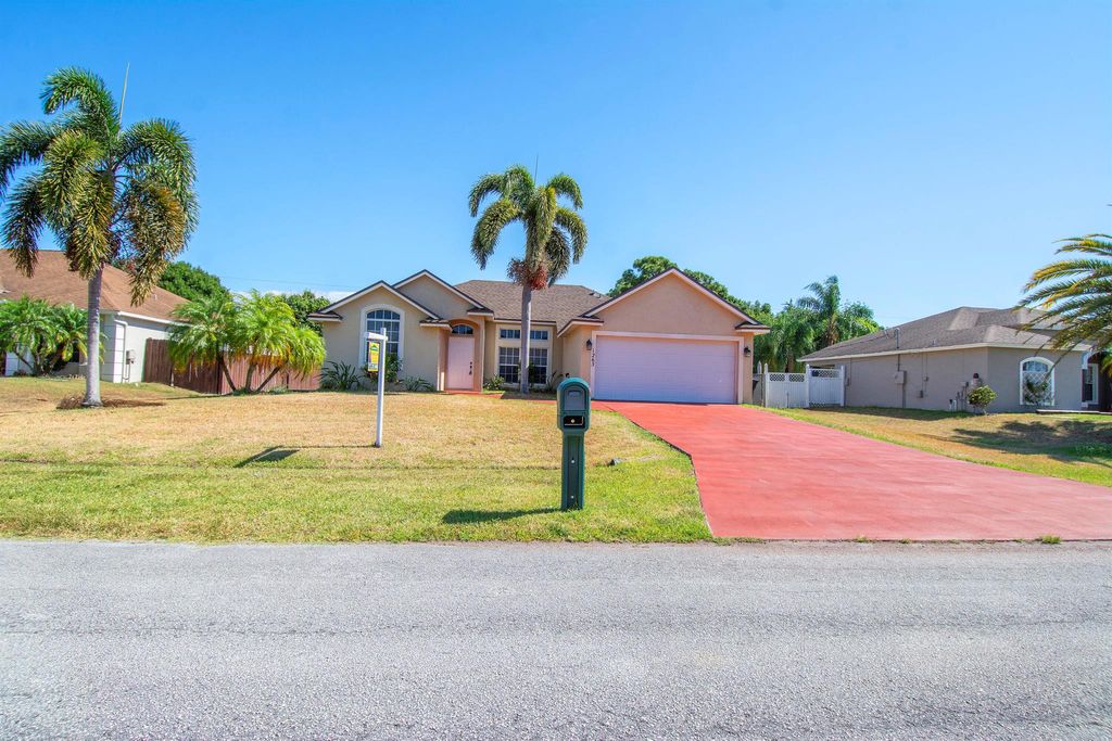 Photo of 1265 SW Fletcher Lane, Port Saint Lucie, FL 34953 (MLS # R10980946)