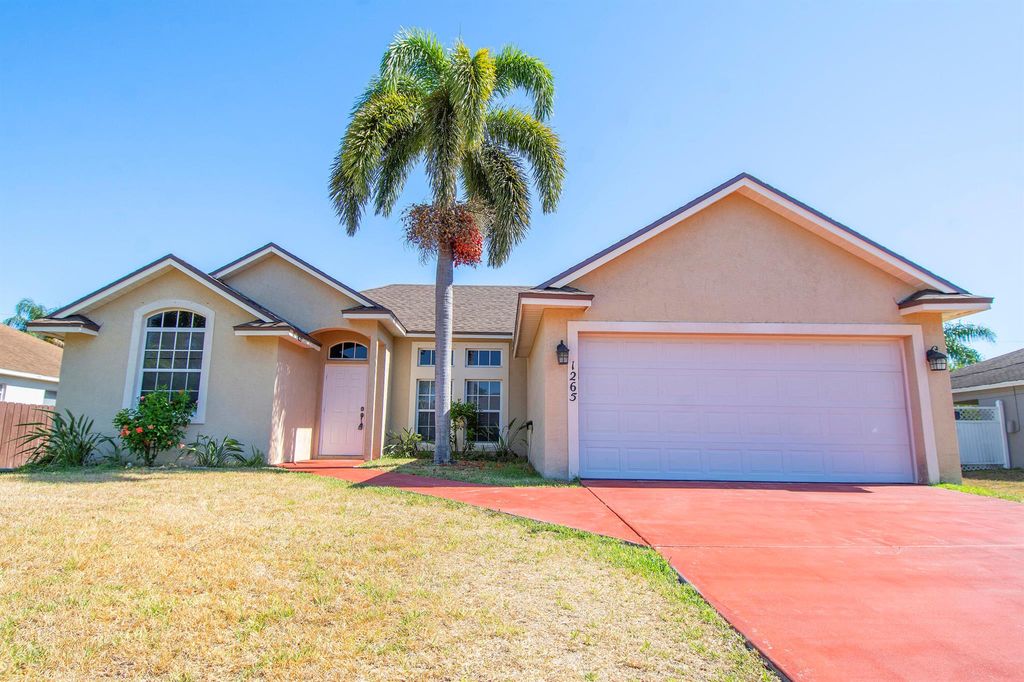 Photo of 1265 SW Fletcher Lane, Port Saint Lucie, FL 34953 (MLS # R10980946)