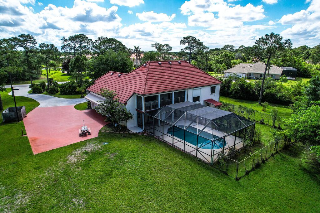 Photo of 7868 Saddlebrook Drive, Port Saint Lucie, FL 34986 (MLS # B26020920)