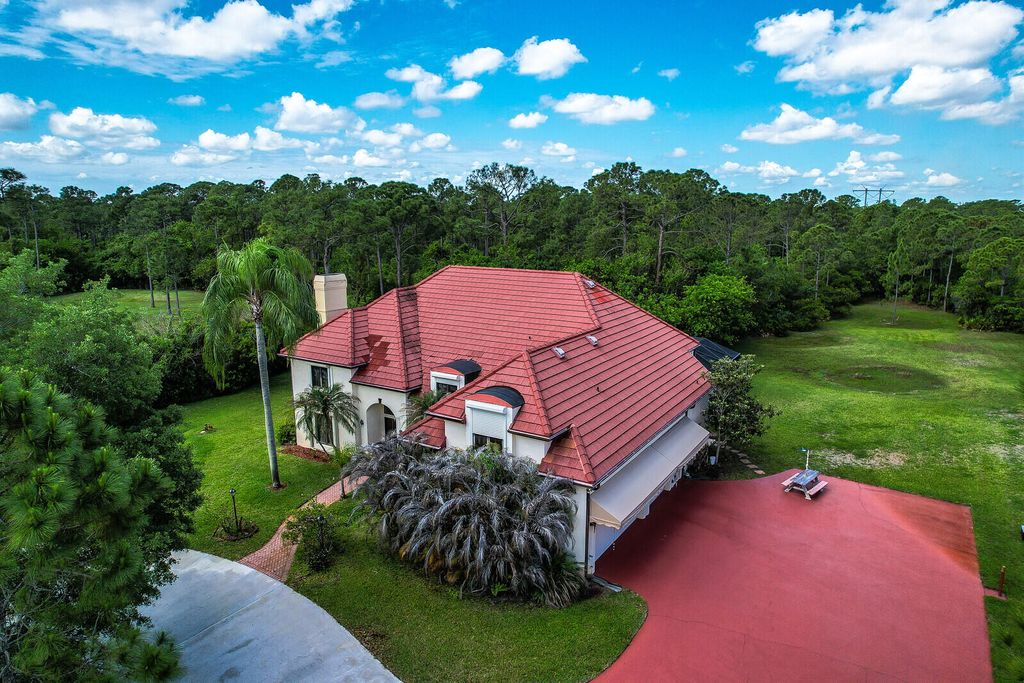 Photo of 7868 Saddlebrook Drive, Port Saint Lucie, FL 34986 (MLS # B26020920)