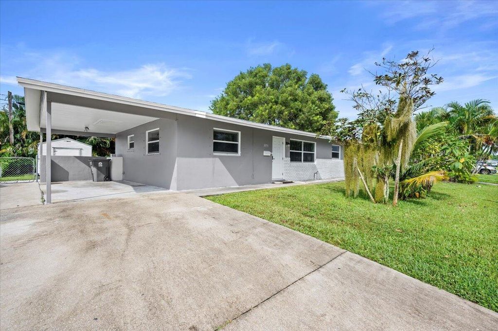 Photo of 3251 Capri Road, Palm Beach Gardens, FL 33410 (MLS # R10963583)