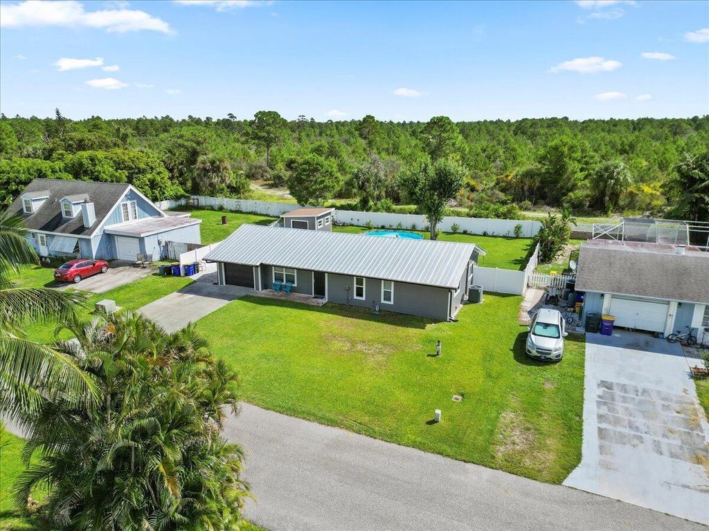Photo of 5451 SE Grafton Avenue, Stuart, FL 34997 (MLS # R10925141)