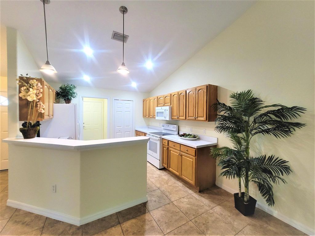 Photo of 11124 Hotchkiss Drive #B, Sebastian, FL 32958 (MLS # R11105825)