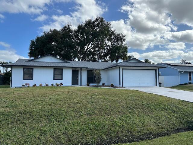 Updated 3/2/2 centrally located. Kitchen has granite countertops and stainless steel appliances. New roof in 2024, Inside and outside painted in 2024. Large yard with screened patio. Great neighborhood close to schools and shopping
