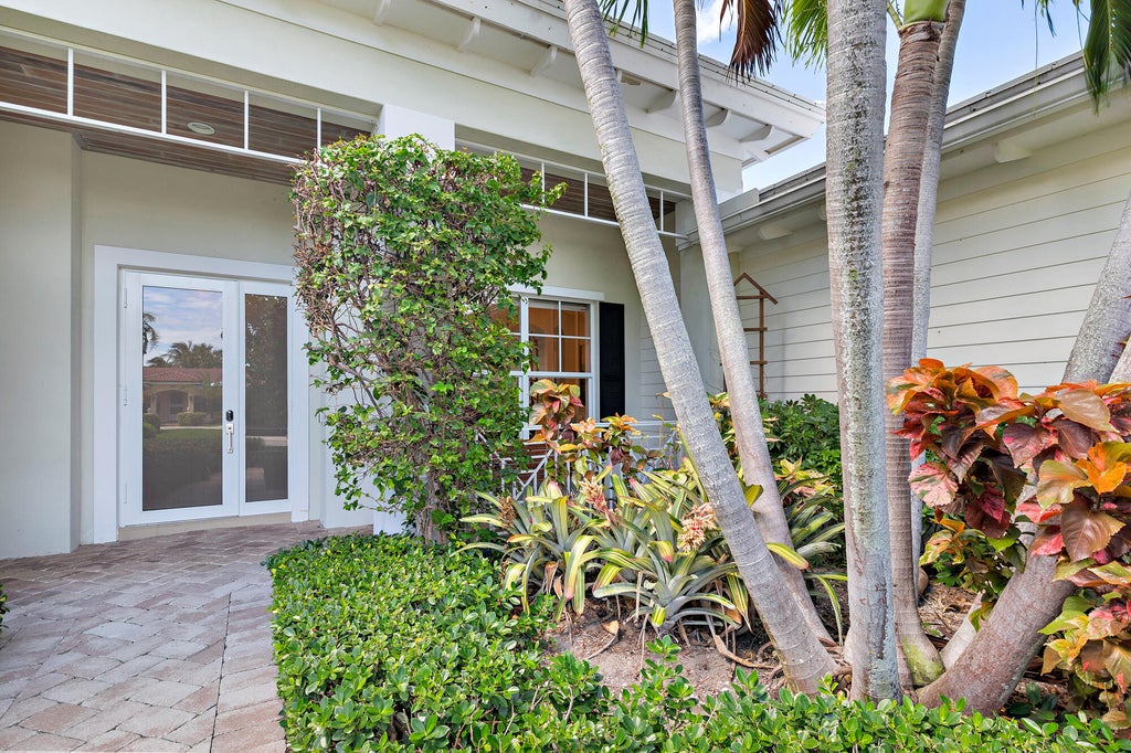Photo of 235 Claremont Lane, Palm Beach Shores, FL 33404 (MLS # B26039976)