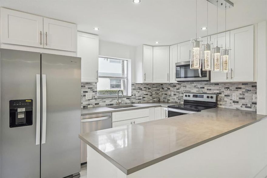 Remodeled first-floor 2BR/2BA unit for rent in King's Point. Features a spacious living room, open-concept kitchen, and tile floors throughout. Assigned parking and guest space conveniently located in front of the unit and patio door. Washer/dryer hookup included.King's Point is a vibrant 55+ community offering pools, golf, tennis and pickleball, theater, bistro, salon, fitness classes, and a FREE courtesy bus to shopping, dining, banks, clubhouses, and Delray Medical Center.