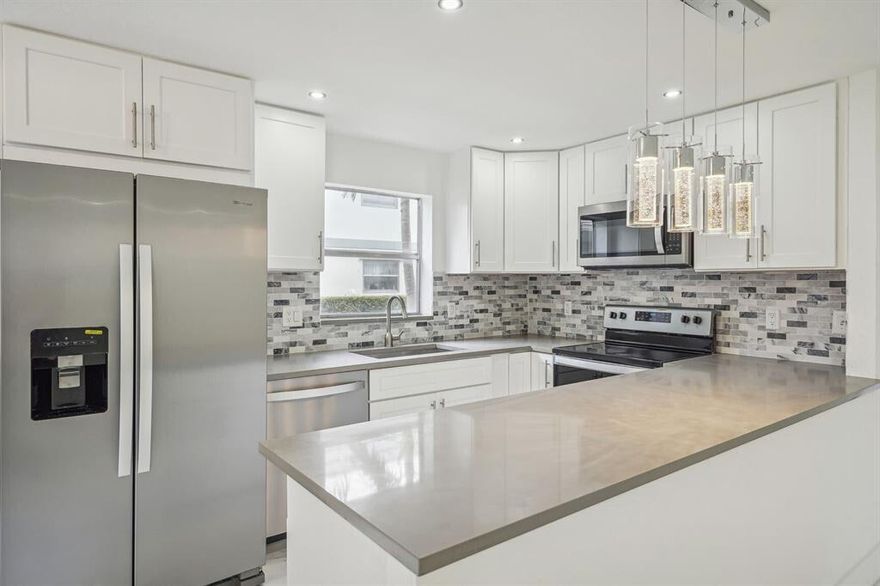 Remodeled first-floor 2BR/2BA unit for rent in King's Point. Features a spacious living room, open-concept kitchen, and tile floors throughout. Assigned parking and guest space conveniently located in front of the unit and patio door. Washer/dryer hookup included.King's Point is a vibrant 55+ community offering pools, golf, tennis and pickleball, theater, bistro, salon, fitness classes, and a FREE courtesy bus to shopping, dining, banks, clubhouses, and Delray Medical Center.