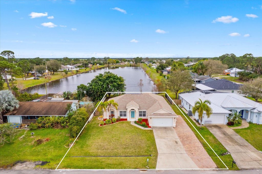 Photo of 344 SW Columbus Drive, Port Saint Lucie, FL 34953 (MLS # R10958399)