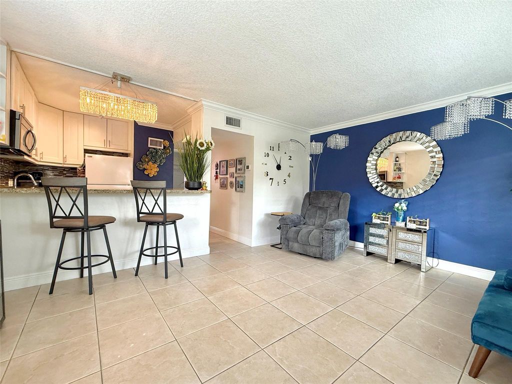 Photo of 2124 NE 5th Ave #101, Wilton Manors, FL 33305 (MLS # F10533634)