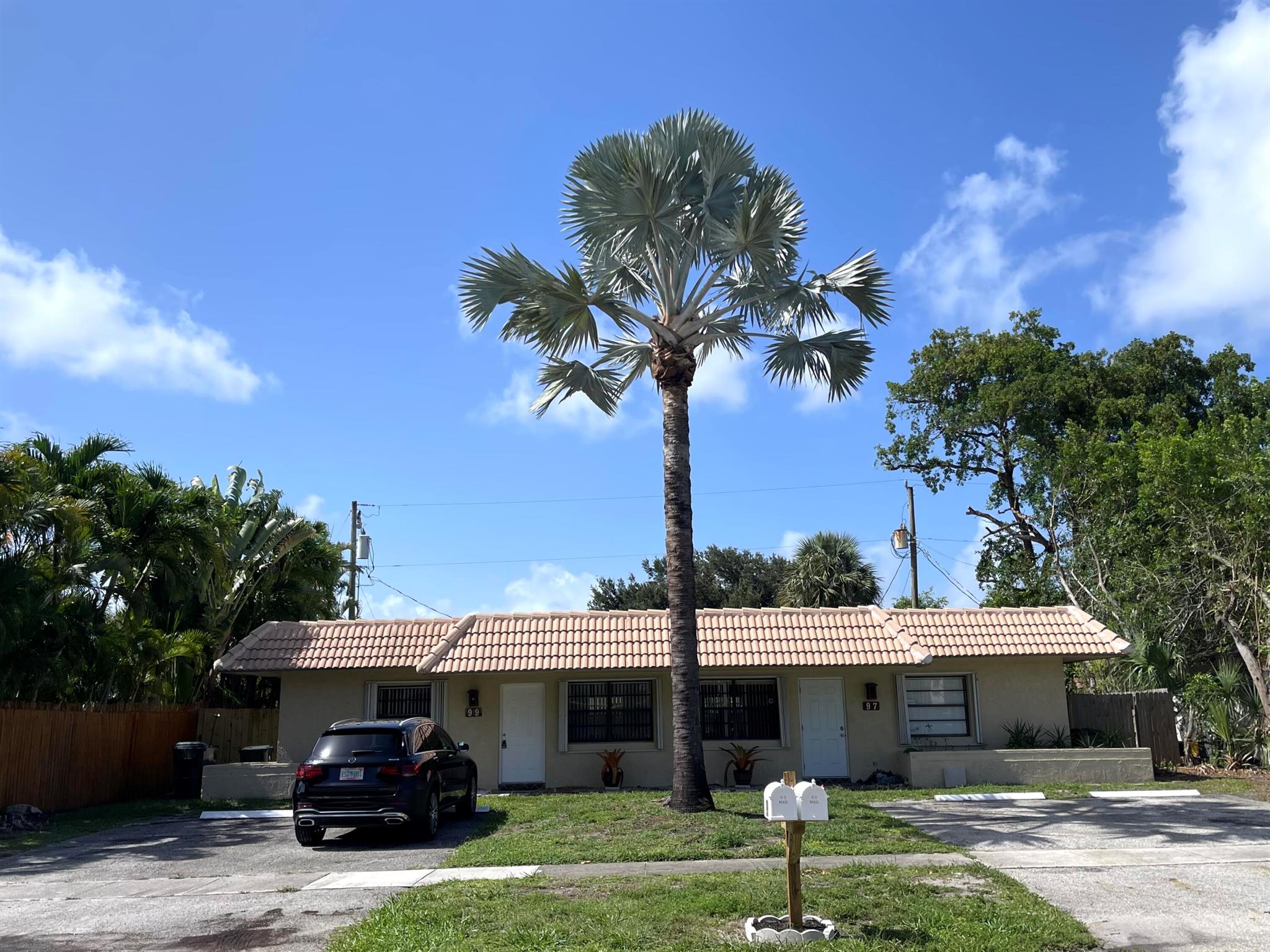 Fantastic location 2/2 with private fenced yard ,screen covered patio and extra family room .