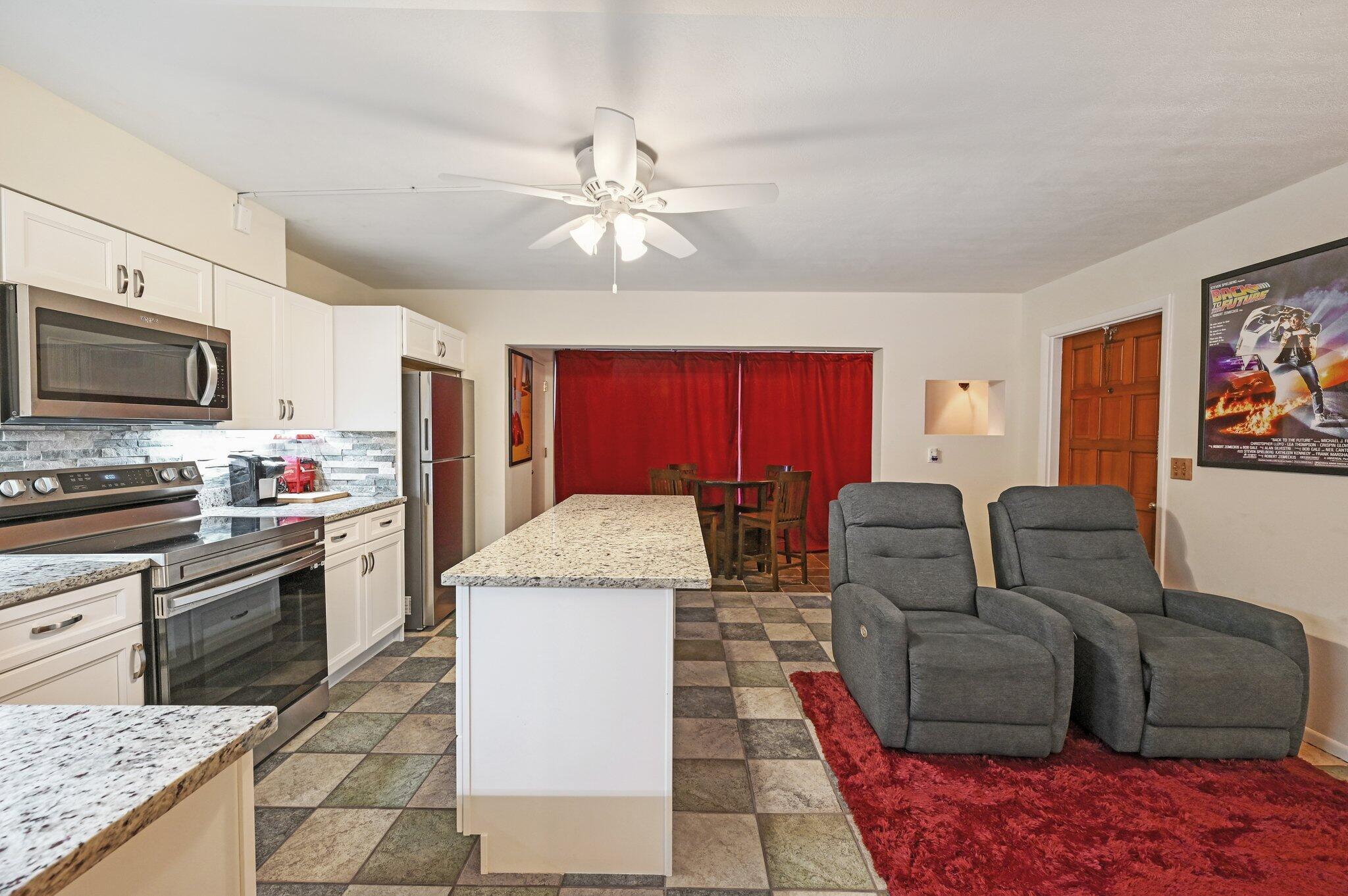 Lights, Camera, Beach! Renovated 1BR/1BA ground-floor condo on Hutchinson Island, just 140 ft to beach access and 75 ft to pool. Fully furnished and movie-themed, with new granite counters, new stainless appliances, and tile floors. All utilities included: electric, water, sewer, trash, cable, and internet. Located in the heart of Hutchinson Island excitement--close to Strawberry's, Kyle G's, and The Magic Oyster. Seasonal/monthly rental--pricing varies. Enjoy fishing, snorkeling, boating, sea turtle sightings, and Jammin' Jensen. 30-day min. No pets. Ocean front buildings currently under renovations.