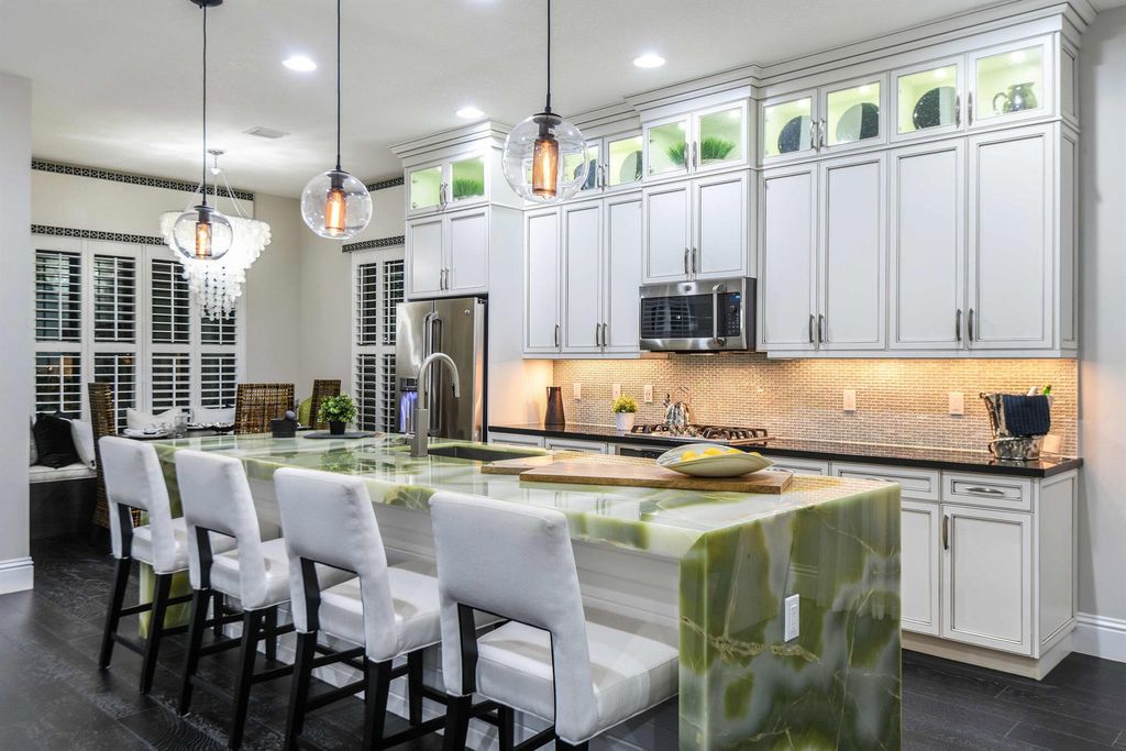 Photo of 1026 Faulkner Terrace, Palm Beach Gardens, FL 33418 (MLS # R10902536)