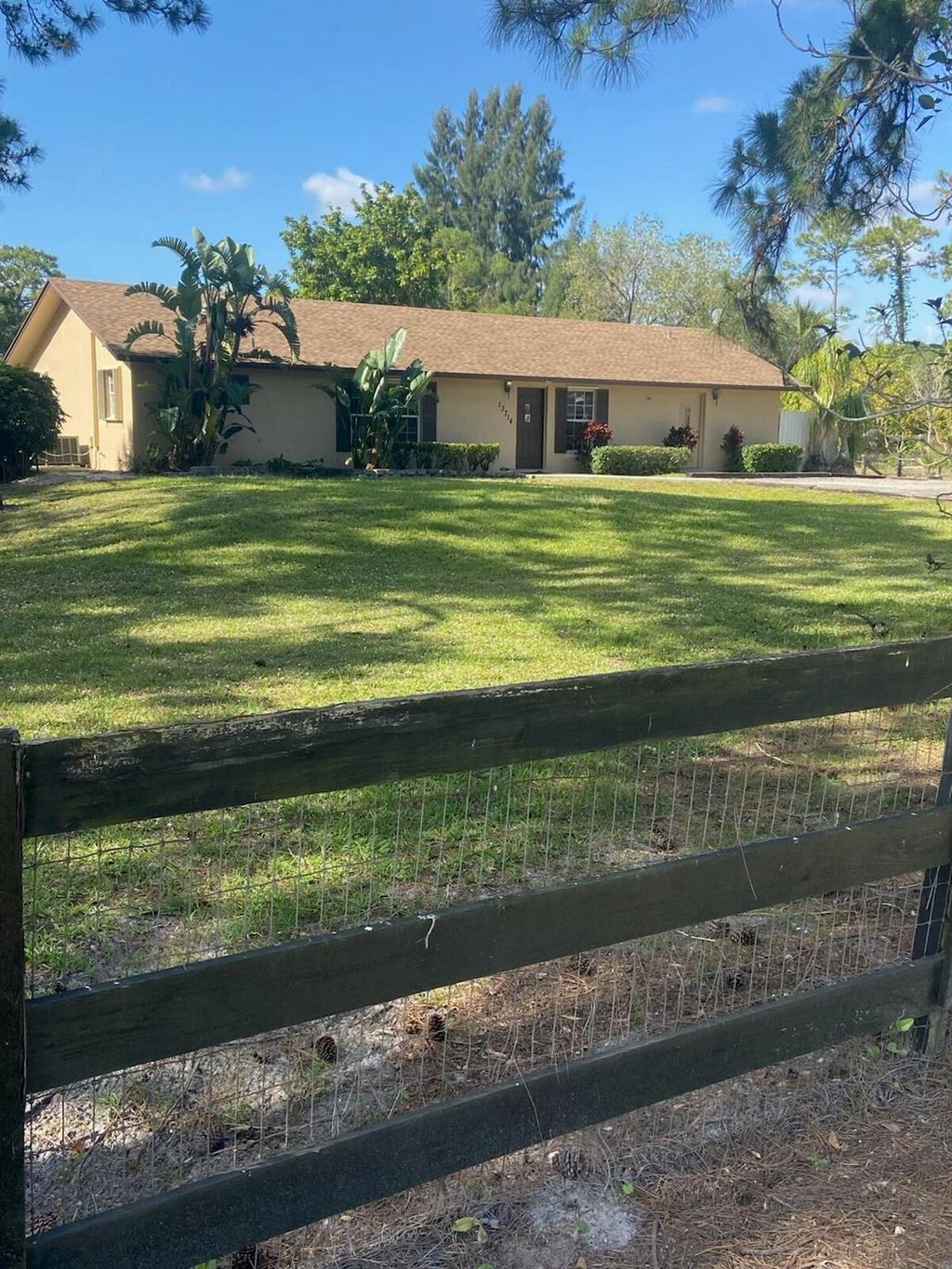 Photo of 13714 76 Road N, West Palm Beach, FL 33412 (MLS # R11078729)