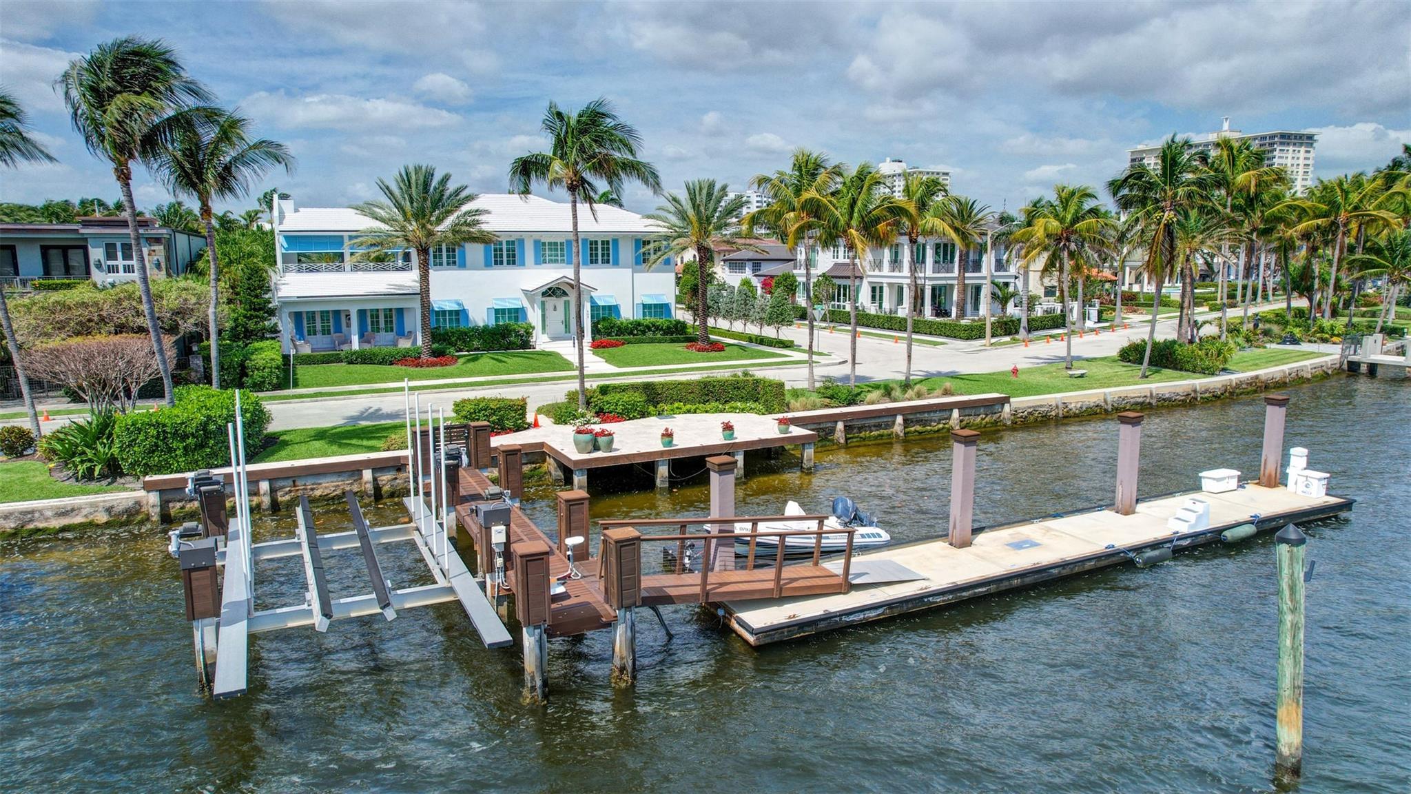 Newly built custom Intracoastal Estate offers a daily boat parade with wide open Intracoastal views from many rooms. Superbly located in highly desirable, security patrolled Idlewyld, close to beaches & Las Olas. Barely occupied, shows impeccably & as-new! Sophisticated island inspiration, high quality construction, millwork & natural finishes, hardwood floors & unique marbles. Lutron technology. Ultimate Chef's kitchen, professional grade appliances. 1st level: media, living & dining areas, 6th bed suite/home office option. Upstairs 4 bedrooms + ultra-luxury Primary Suite, dual closets/spa baths. The sale price included the vacant lot next door. There was also a furniture allocation and other factors that affected the recorded sales price.