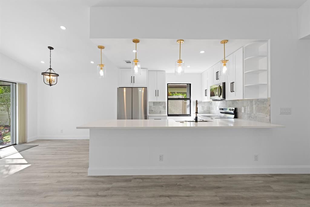 Photo of 69 Ironwood Way N, Palm Beach Gardens, FL 33418 (MLS # R10867893)