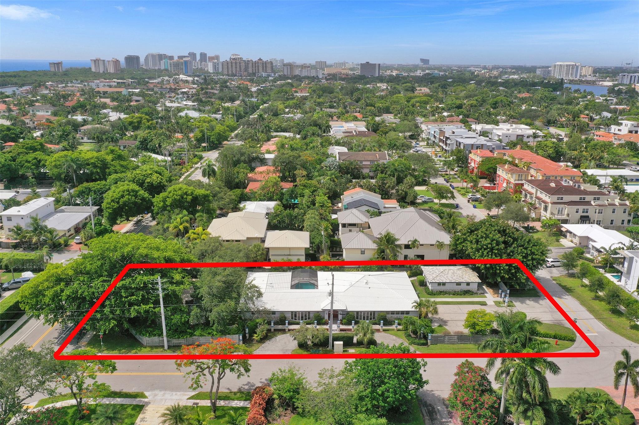 Don't miss this development opportunity for one of the largest properties in the heart of Coral Ridge! This residence is situated on a 24,659 square foot double lot and consists of a main house and a guest house. Perfect for transforming into the home of your dreams or redeveloping it into a multi-family complex. The property features views of the sparkling pool from the main living areas, a beautiful backyard with a park-like setting and a sidewalk circling the entire perimeter making it completely handicap accessible. Just minutes to the beach, restaurants and shops this property is located in an excellent rated school district.