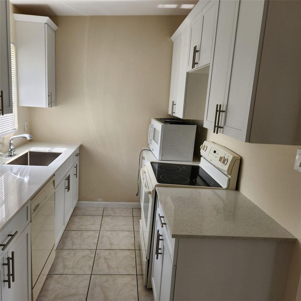 Photo of 3136 N Seacrest Boulevard, Boynton Beach, FL 33435 (MLS # F10521517)