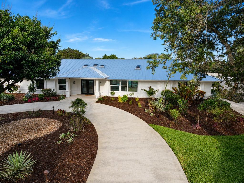 Photo of 5297 SW Anhinga Avenue, Palm City, FL 34990 (MLS # B26046187)
