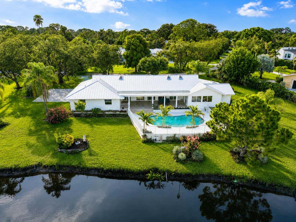 Photo of 5297 SW Anhinga Avenue, Palm City, FL 34990 (MLS # B26046187)